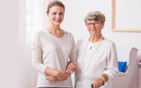 portrait of caregiver and senior woman